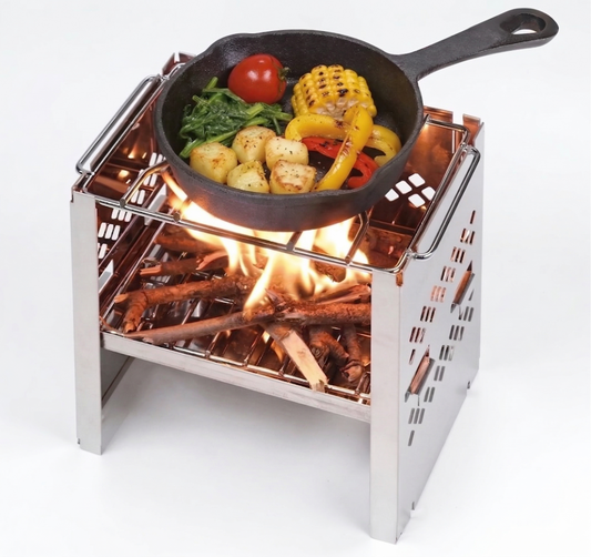 Portable folding stainless steel camp stove with carry bag for backpacking, camping, hiking, and outdoor cooking.